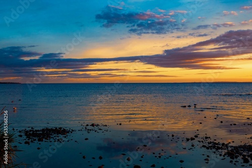 Beautiful Sunset In the Final Moments Of The Golden Hour, Reflecting On The Waters Of Lough Neagh, Northern Ireland photo