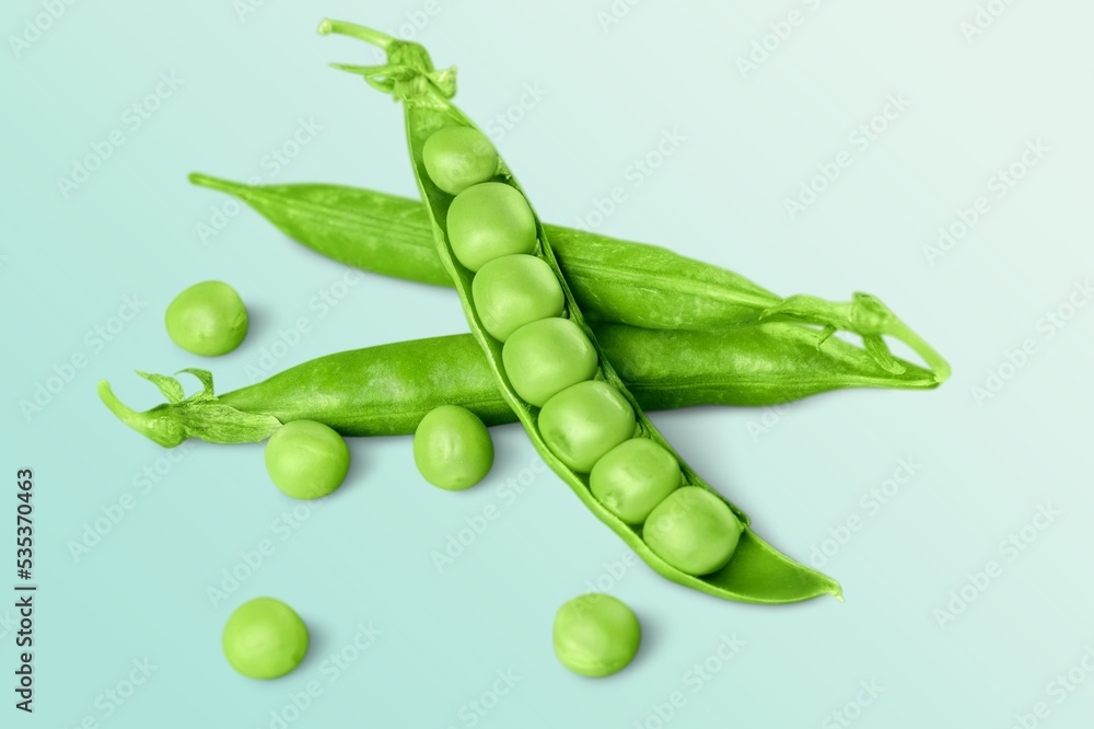 Perfect tasty green peas in pod on the desk Perfect tasty green peas in pod on the desk