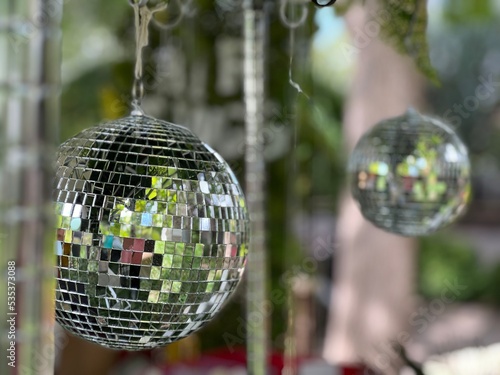 Shimmering Disco Balls Hanging in Outdoor Setting