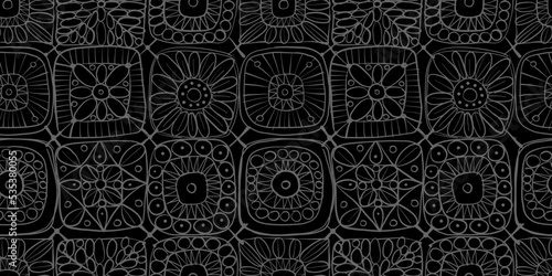 Granny square crochet. Seamless pattern background. Knitted wear. Folk art motif with flowers. Vector illustration