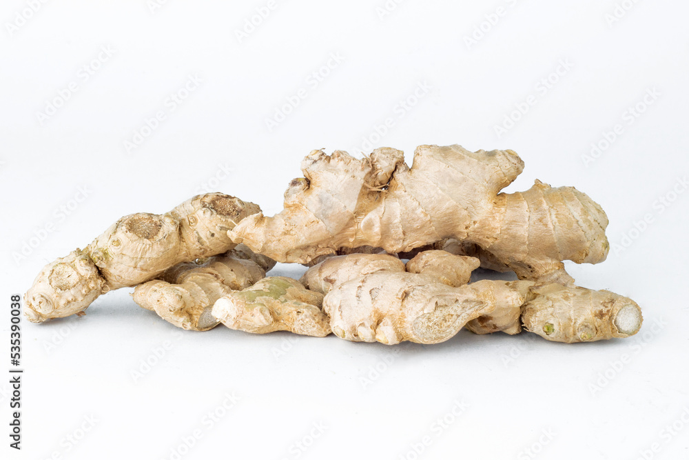 pile of ginger on white background pile of ginger on white background
