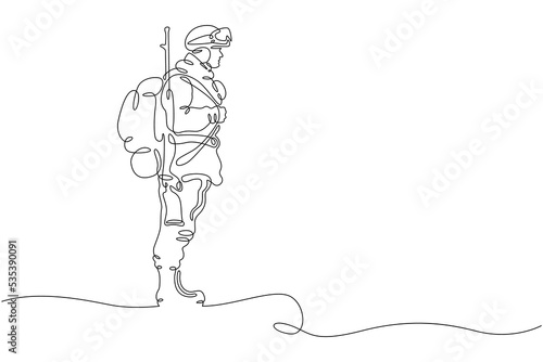 One continuous line.Modern military man in outfit. Soldier with weapons. Warrior in uniform.  One continuous line is drawn on a white background. photo