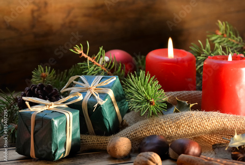 traditional christmas decoration with natural materiau and dried fruit in can...