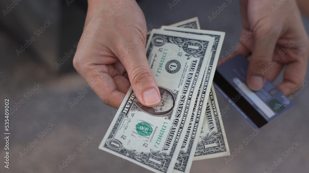 Man with dollar banknote which he is show of money and exchanging money while could be used for anything from business image Man with dollar banknote which he is show of money and exchanging money while could be used for anything from business image