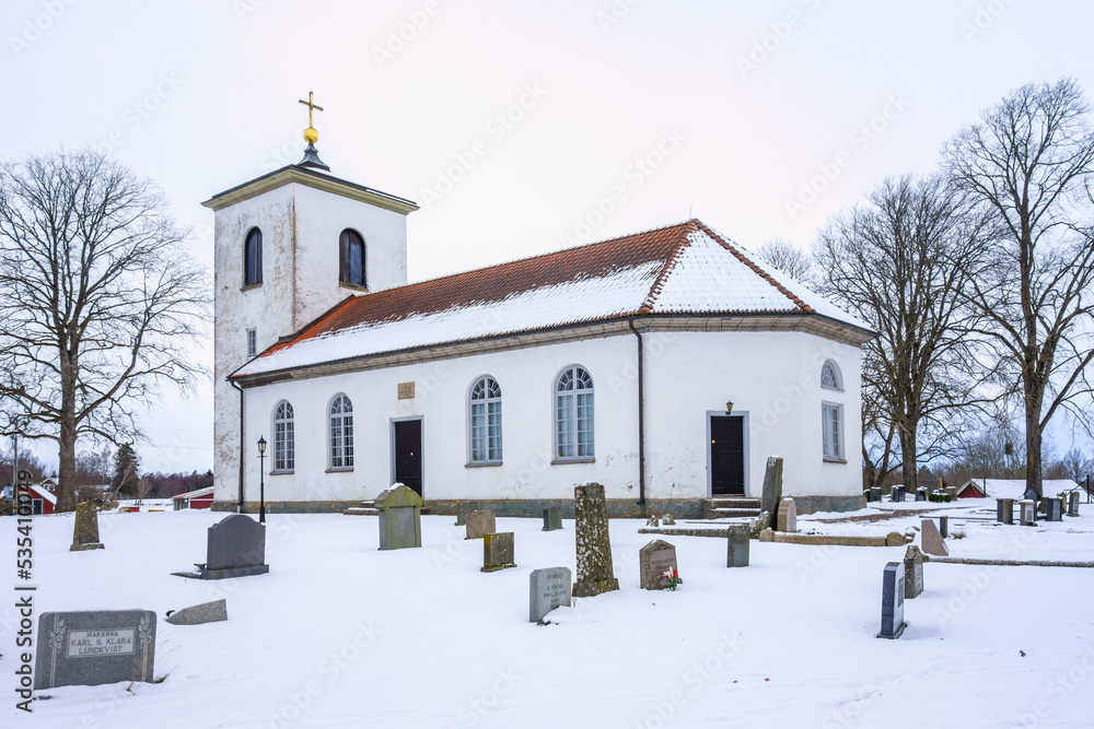 Country church with snow in winter