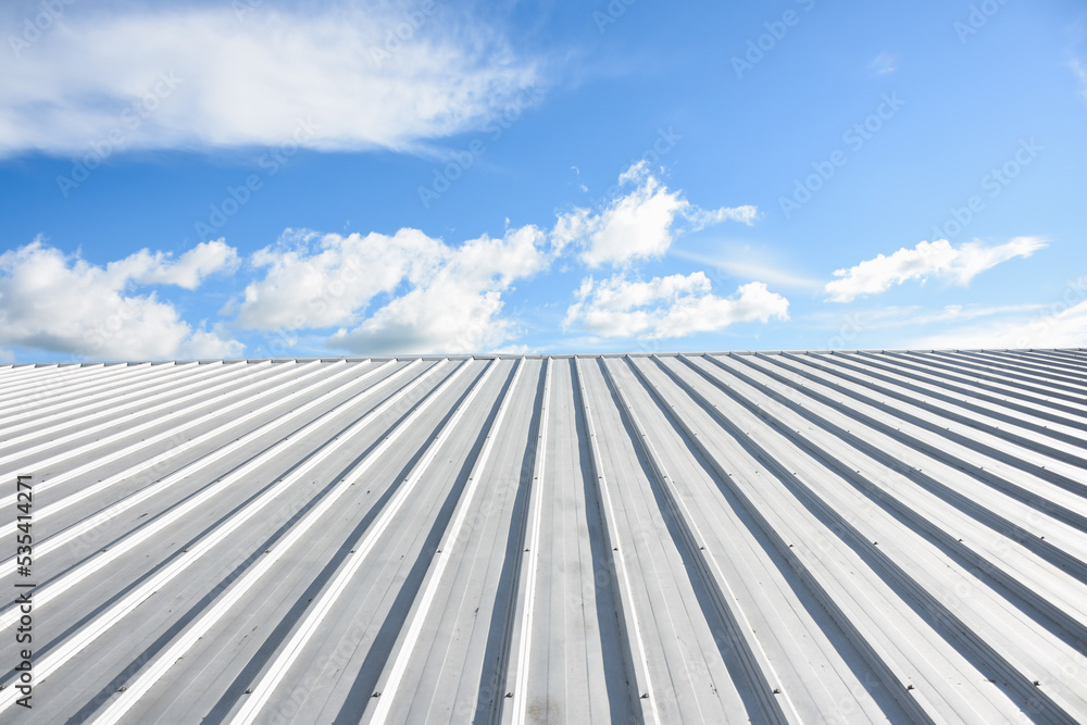 metal sheet roofing on commercial construction with blue sky metal sheet roofing on commercial construction with blue sky