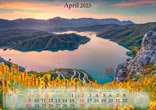 Horizontal wall calendar for 2023 year. April, B3 size. Set of calendars with amazing landscapes. Fantastic sunrise on Bovilla Lake, Tirana city located, Albania. Monthly calendar ready for print..