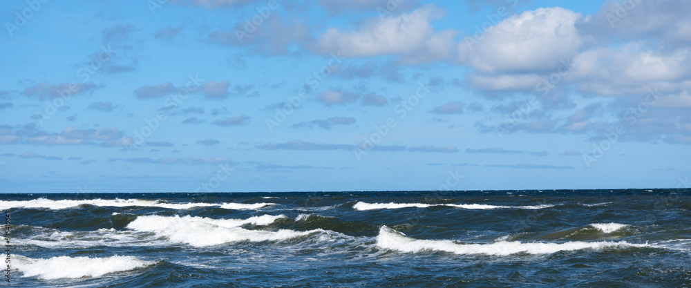 Beautiful sky and sea with waves to the horizon