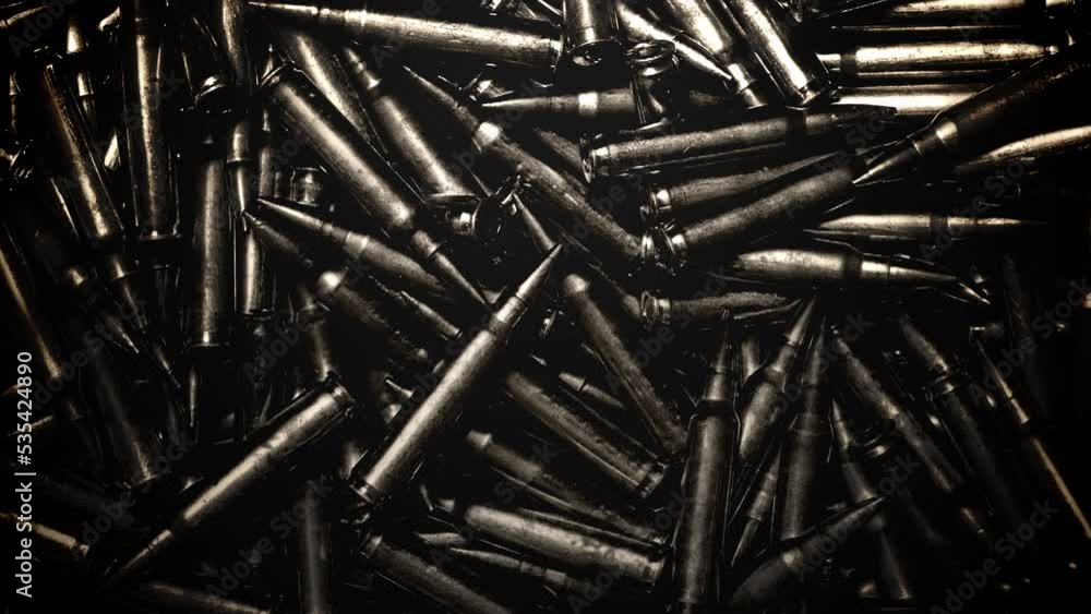 Many bullet from war on dark table, abstract cinematic, war and military style background Many bullet from war on dark table, abstract cinematic, war and military style background