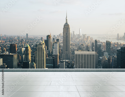 Empty concrete rooftop on the background of a beautiful Manhattan skyline at daytime, mock up