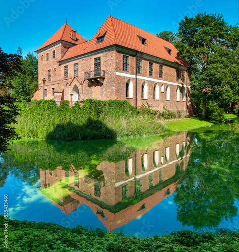 Oporowski Castle build in the Gothic style in the years 1434 - 1449. Oporow, Lodz Voivodeship, Poland photo