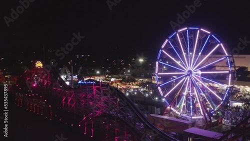 Drone Fly Towards The Fun Fair Rides At The Washington State Fair In Puyallup, Washington, USA. Aerial Shot photo