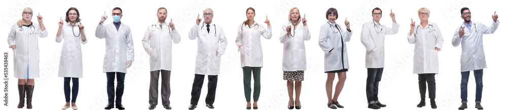 group of doctors in full length isolated on white group of doctors in full length isolated on white