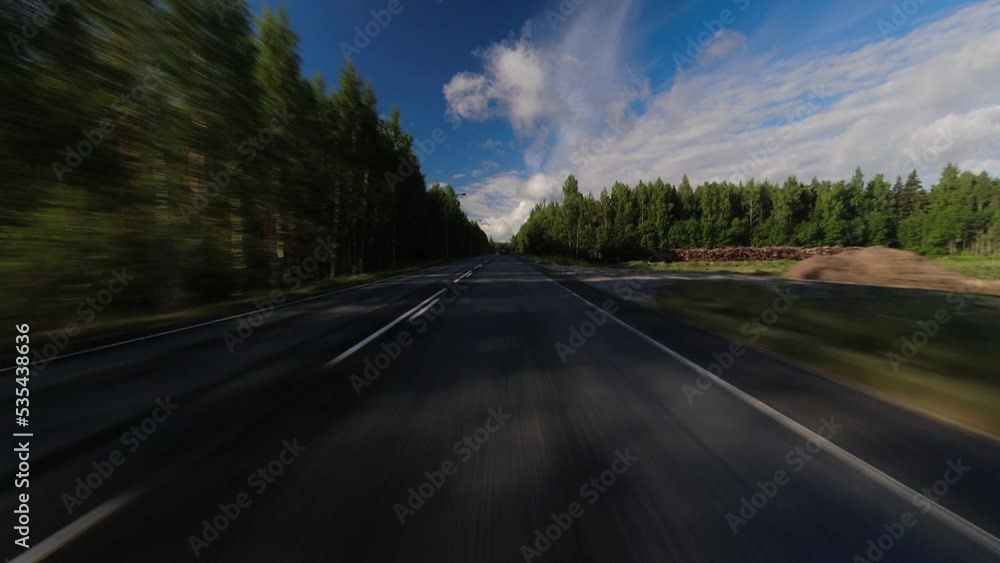Timelapse shot from a car driving along the roads passing traffic and stopping at lights Timelapse shot from a car driving along the roads passing traffic and stopping at lights