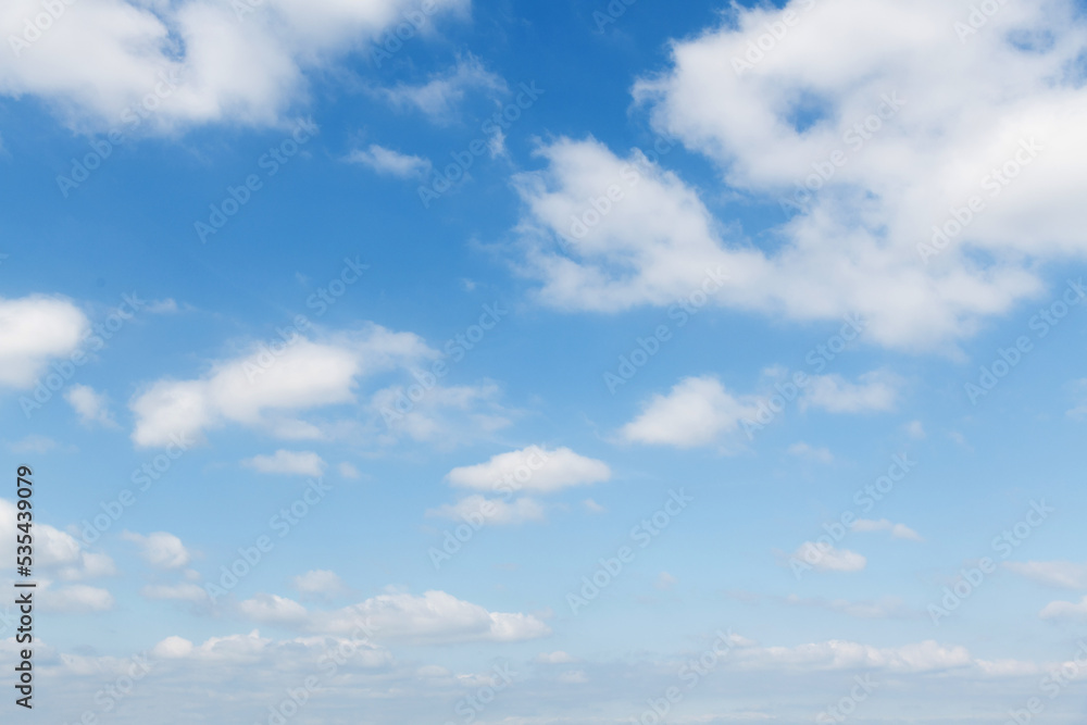 Blue sky with white clouds background Blue sky with white clouds background