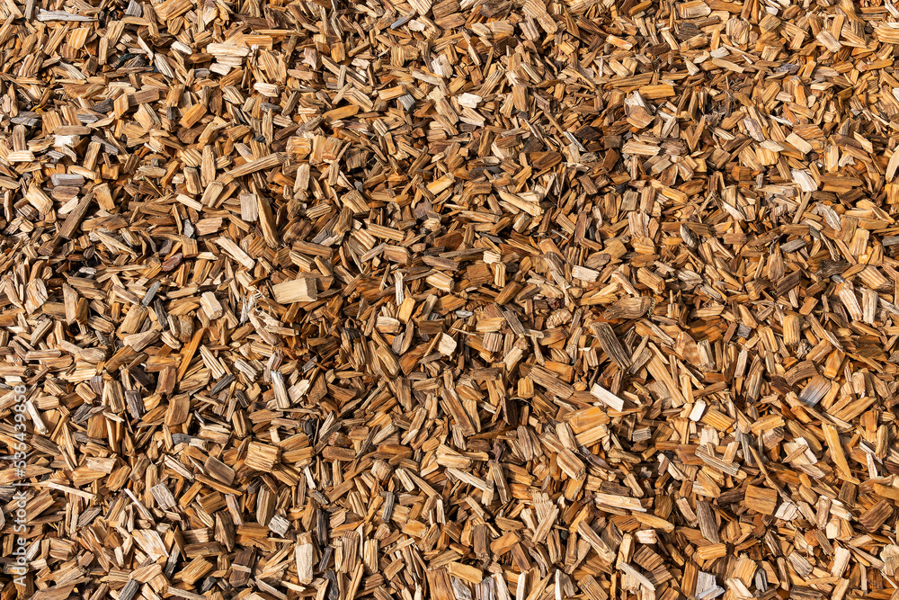 Wood chip bark chippings having been shredded for use as a garden mulch by the lumber timber industry which can be used as an abstract texture background, stock photo image Wood chip bark chippings having been shredded for use as a garden mulch by the lumber timber industry which can be used as an abstract texture background, stock photo image