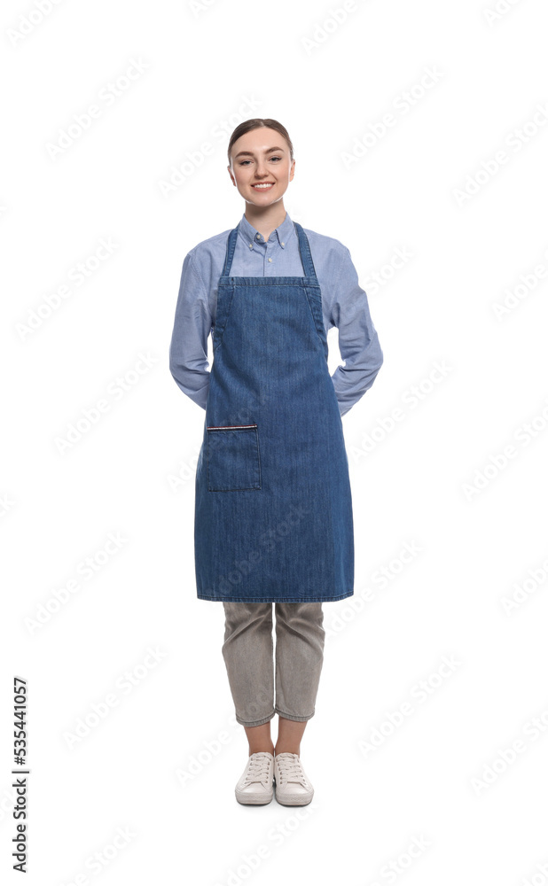 Beautiful young woman in clean denim apron on white background Beautiful young woman in clean denim apron on white background