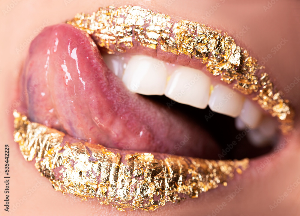 close up of a lips. Golden lips. Beauty photo. Beauty fashion photo. Love girl. Sensual. close up of a lips. Golden lips. Beauty photo. Beauty fashion photo. Love girl. Sensual.