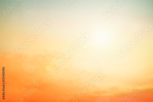 Abstract blurred sunlight beach colorful blurred background with retro effect autumn sunset sky have blue bright, white, and color orange calm.