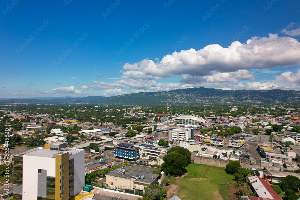 Aerial view of Kingston city, Jamaica. City landscape, roads, buildings, mountains