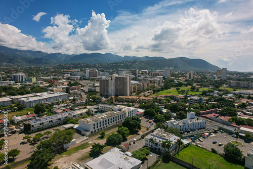 Aerial view of Kingston city, Jamaica. City landscape, roads, buildings, mountains