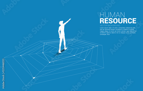 Silhouette of businessman standing and point ahead on spider chart. Concept of perfect recruitment. Human Resource. put the right man on the right job.