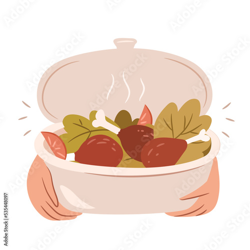Hands holding Thanksgiving food concept. Chicken legs cooked with dressing.