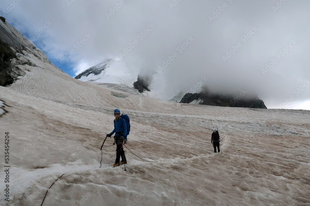 Obraz premium Multi day summer expedition through some glaciers in the alps. On the Monterosa massif starting from Zermatt and summiting multiple 4000m mountains