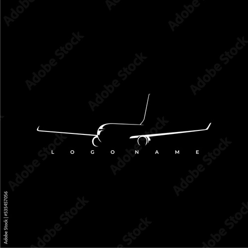 Vector flat passenger airplane on black background. cool for use in logo aviation