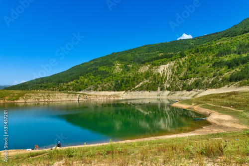 Amazing view of curvy, meandering Zavoj lake on Old Mountain, Serbia. Zavojsko Lake near Pirot © nedomacki