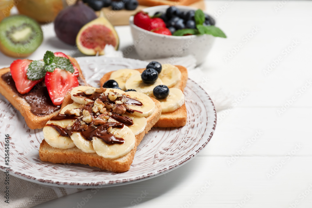 Different sweet delicious toasts on plate, closeup Different sweet delicious toasts on plate, closeup