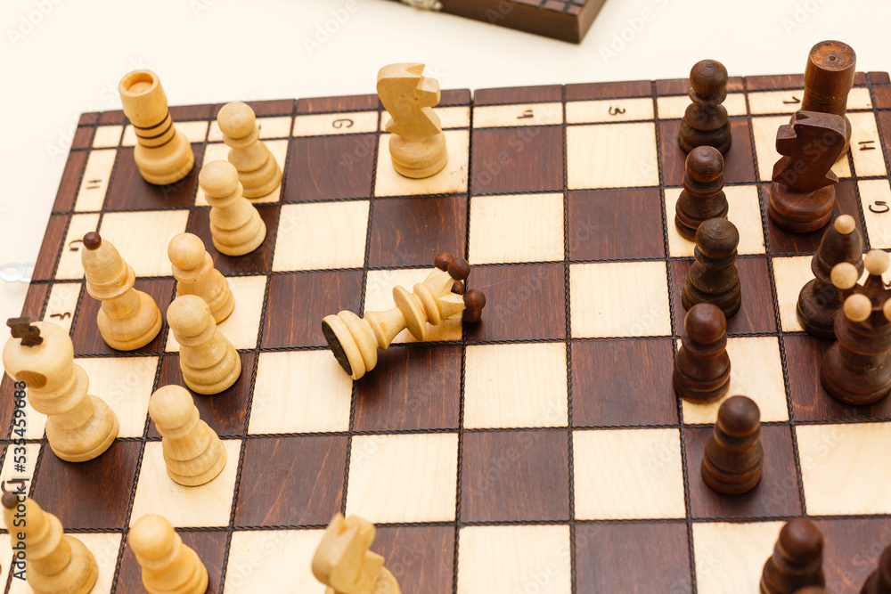 Chess set on the chess board. With selective focus on white pieses. Chess set on the chess board. With selective focus on white pieses.