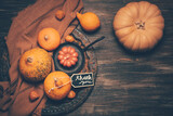 Happy Thanksgiving Day background, wooden table decorated with Pumpkins and Candles
