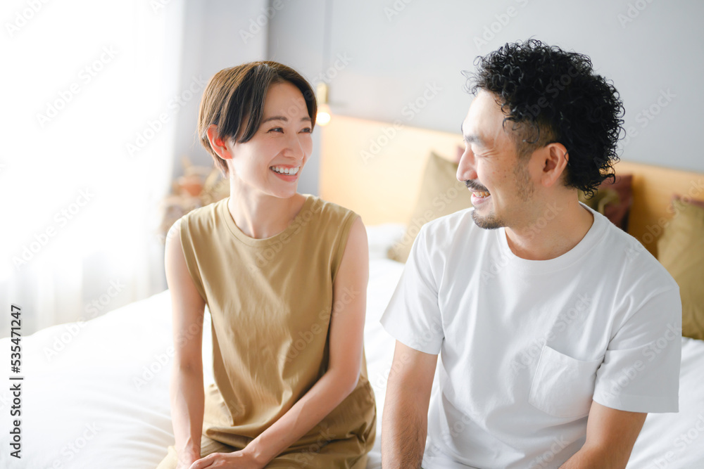Image of a nice couple or couples in their 30s and 40s staring at each other Image of a nice couple or couples in their 30s and 40s staring at each other