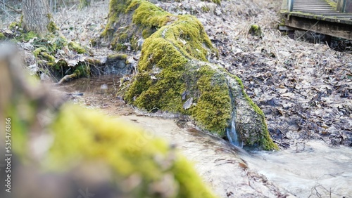 Natural water flow on a chalk drain in Altmuehltal Germany called 