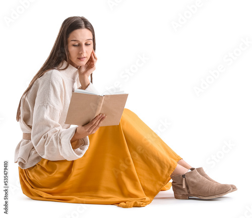 Beautiful woman reading boo...