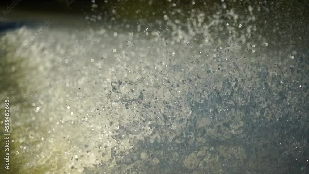 Slow motion video of water splashing from a boat. Slow motion video of water splashing from a boat.