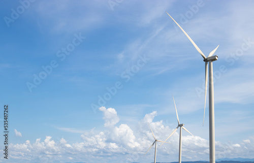 Wind turbine generate electricity with blue sky.