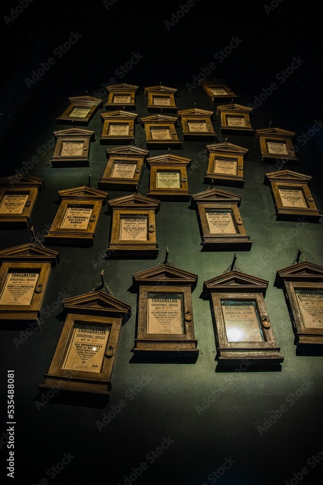 Fototapeta premium Vertical shot of the Wall of Educational Decrees in Harry Potter Studio Tour, London