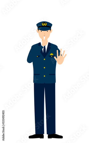 若い男性警官のポーズ、笛を吹いて制止する