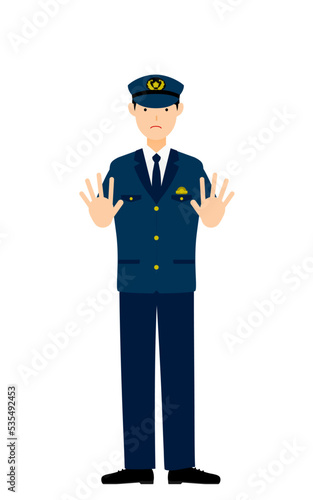 若い男性警官のポーズ、両手を前に出して制止する