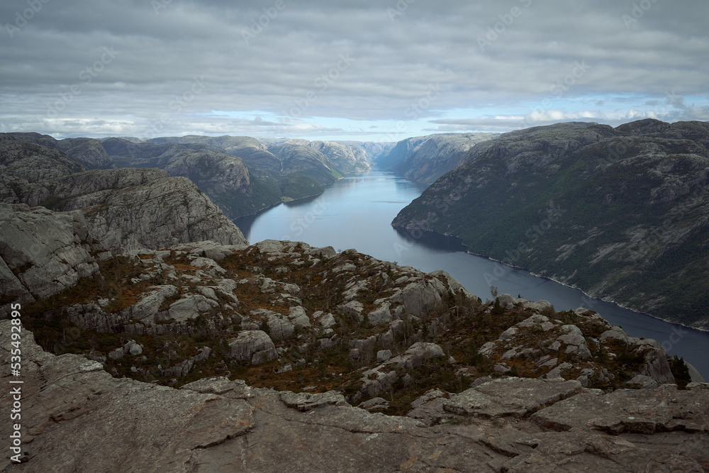Lysefjord aerial panoramic view from the Preikestolen cliff near Stavanger. Preikestolen or Pulpit Rock is a famous tourist attraction in Norway. Lysefjord aerial panoramic view from the Preikestolen cliff near Stavanger. Preikestolen or Pulpit Rock is a famous tourist attraction in Norway.