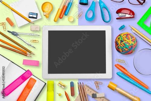 Set of colored school accessories on the desk