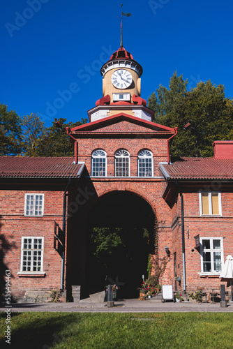 Fiskars, Finland, a village, the town of Raseborg, in western Uusimaa, Finland, with wooden houses, clock tower and old town main street center photo