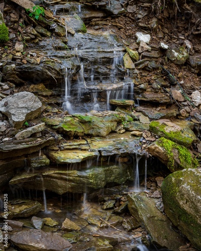 Vertical shot of a small waterfall, Jackson Falls, Tennessee, United States photo