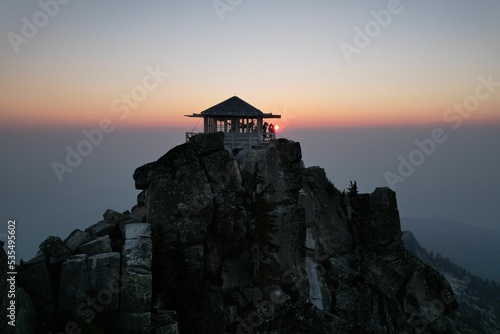 Sunset over Mount Pilchuck Lookout Tower in Washington State photo