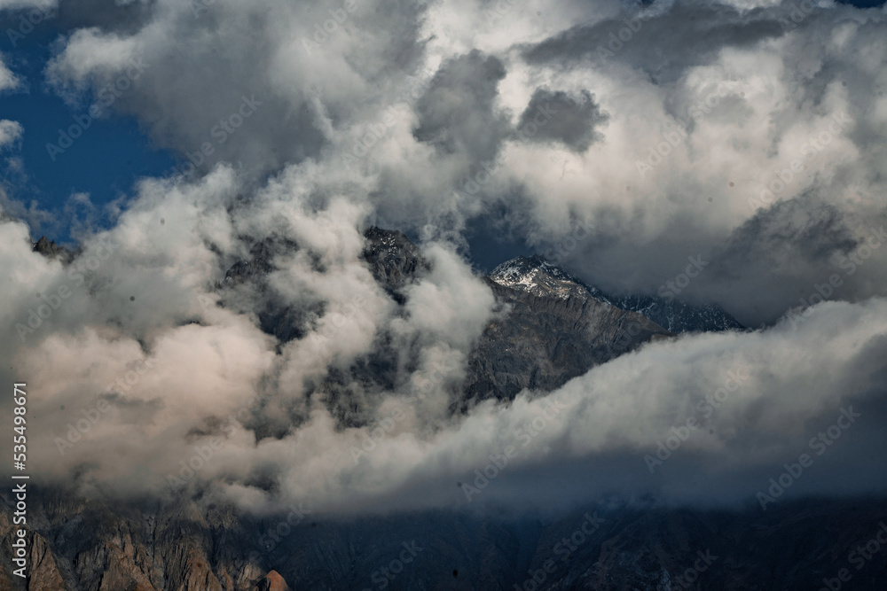 Clouds over mountains, beautiful mountain landscape