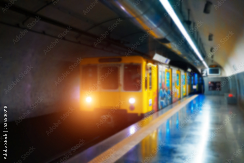 Train metro station in the subway. Blurred image.