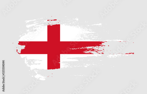 Grunge brush stroke flag of England with painted brush splatter effect on solid background