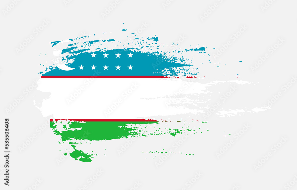 Fototapeta premium Grunge brush stroke flag of Uzbekistan with painted brush splatter effect on solid background